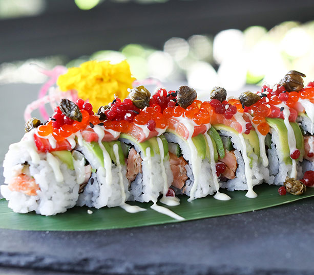 beautifully garnished sushi roll